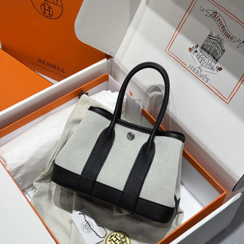 H**mes shopping bags